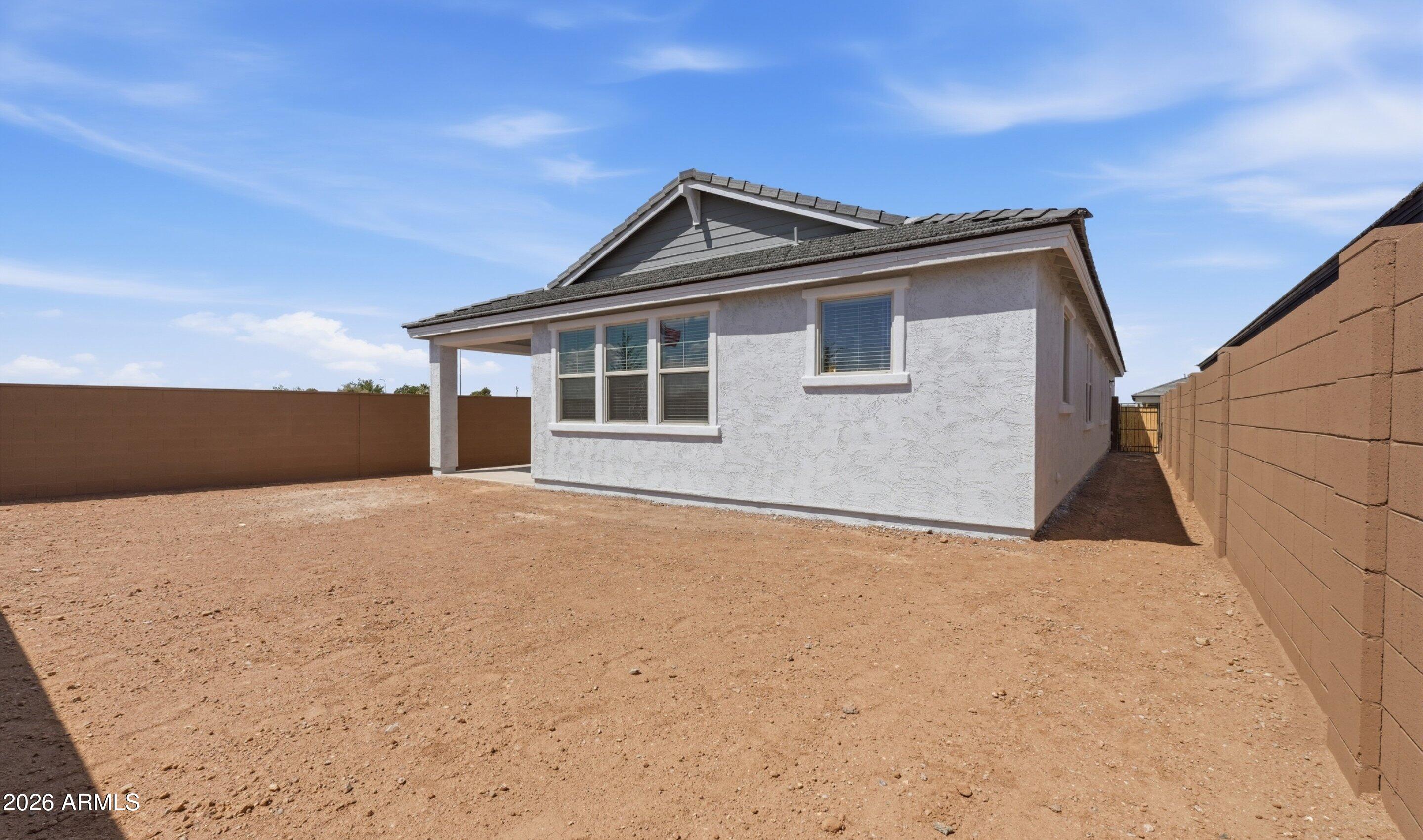 7779 West Sands Road Glendale, AZ 85303 - Photo 32 of 37 a view of an house with a yard