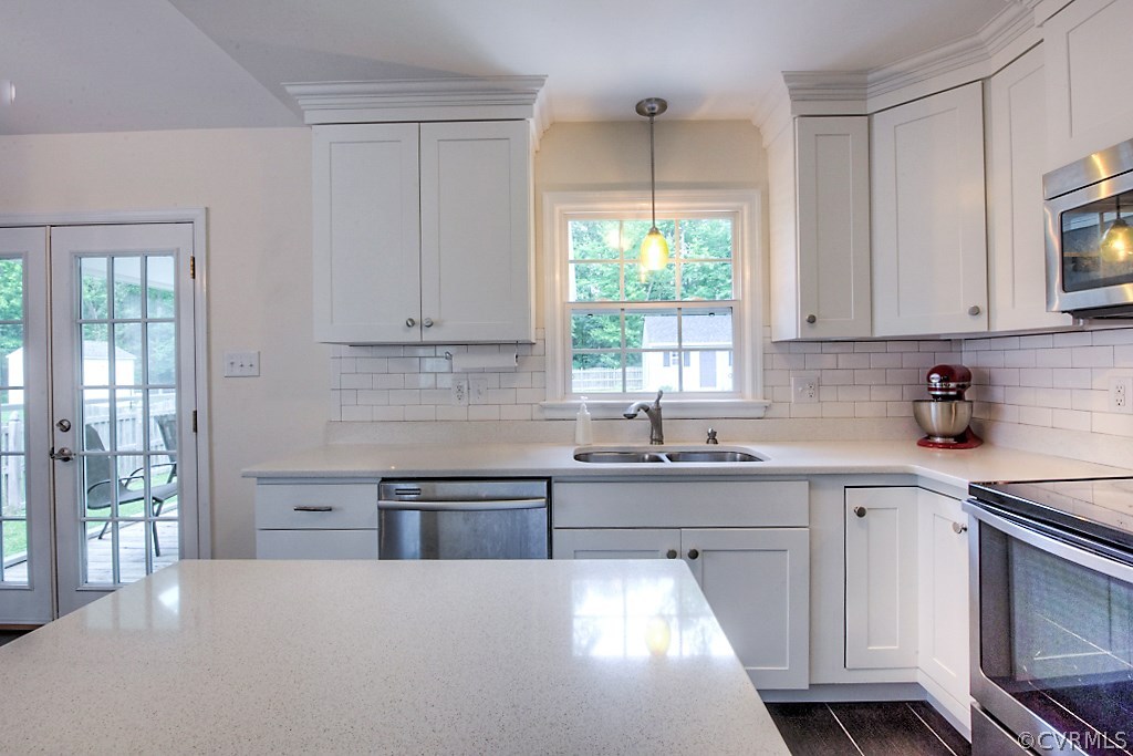 2533 London Road Henrico, VA 23233 - Photo 15 of 35 a kitchen with sink cabinets and window