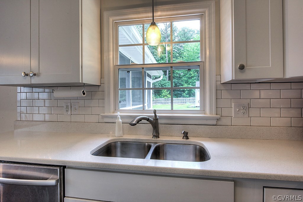 2533 London Road Henrico, VA 23233 - Photo 17 of 35 a close view of a sink and dishwasher with kitchen countertops