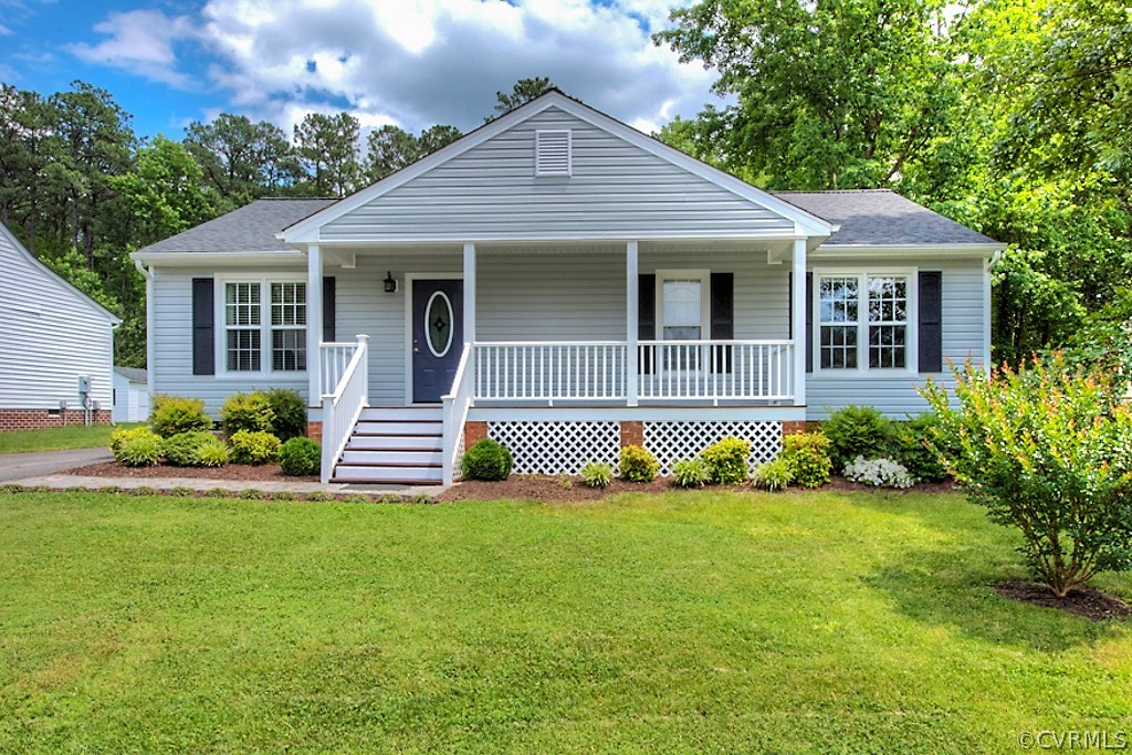2533 London Road Henrico, VA 23233 - Photo 2 of 35 a view of a house with a yard and plants