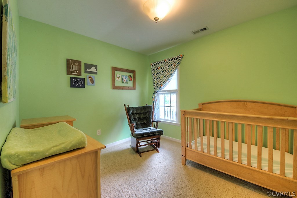 2533 London Road Henrico, VA 23233 - Photo 21 of 35 a bedroom with a bed and furniture