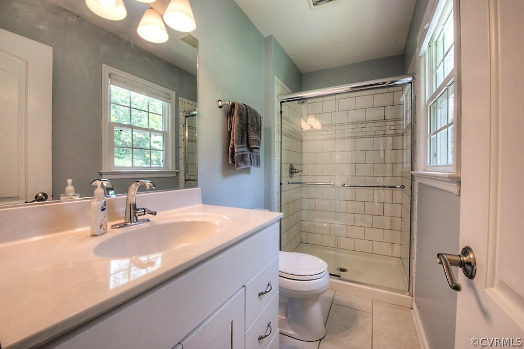 2533 London Road Henrico, VA 23233 - Photo 24 of 35 a bathroom with a sink a toilet and shower