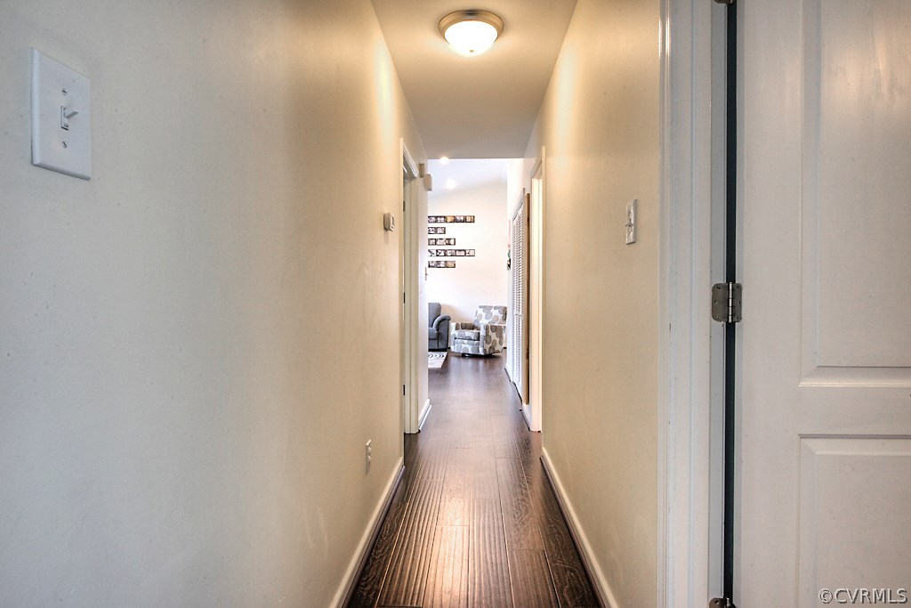 2533 London Road Henrico, VA 23233 - Photo 25 of 35 a view of a hallway with wooden floor and staircase
