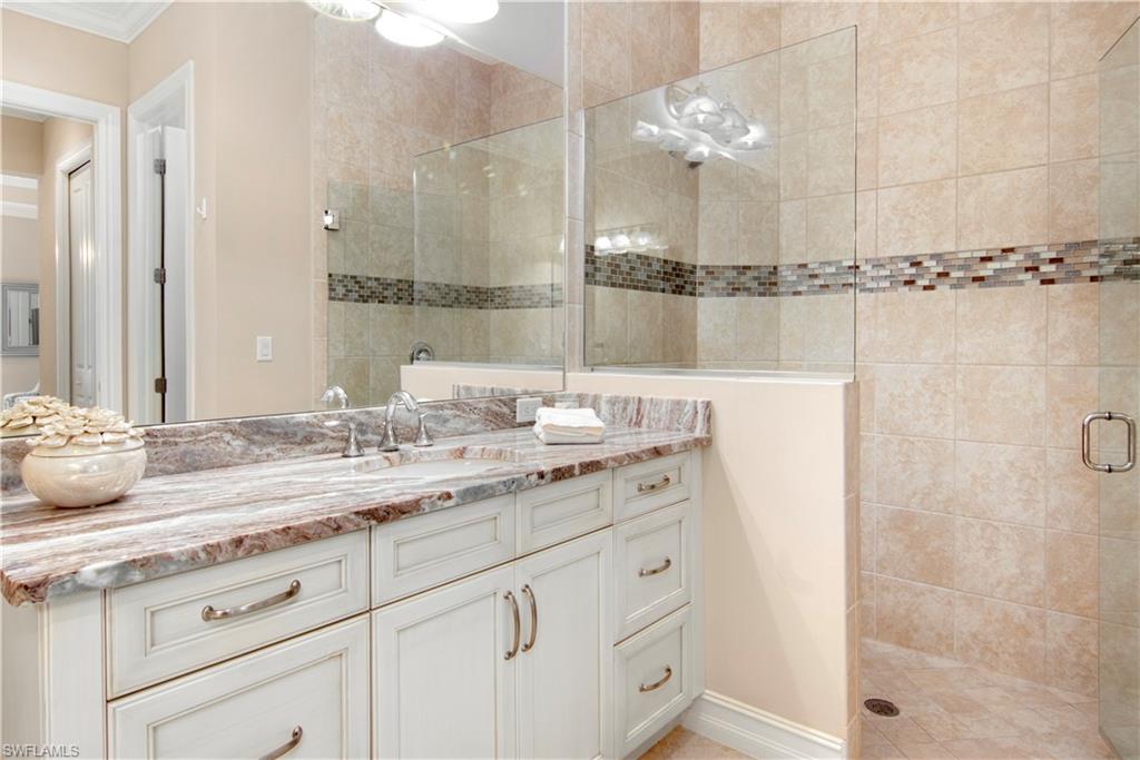 6564 Roma Way Naples, FL 34113 - Photo 19 of 33 Primary Bathroom