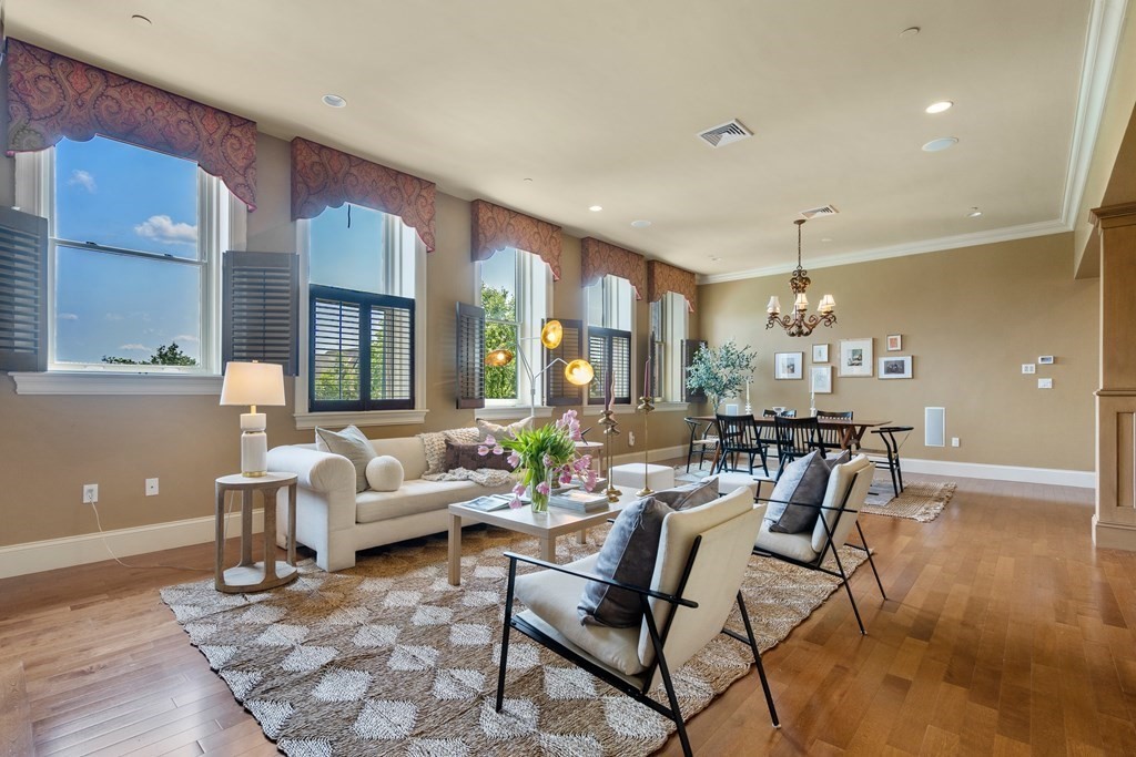 a living room with furniture and a table