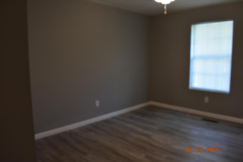 171 Farrar Road Cohutta, GA 30710 - Photo 21 of 24 Hall bath, Step in shower, new toilet, new vanity with granite countertop.