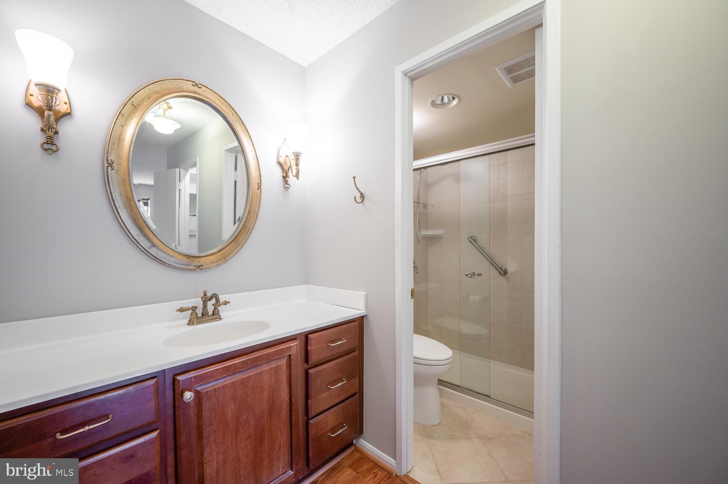 5904 Mt Eagle Drive, Unit 903 Alexandria, VA 22303 - Photo 12 of 45 Full Bath with separate glass-enclosed shower