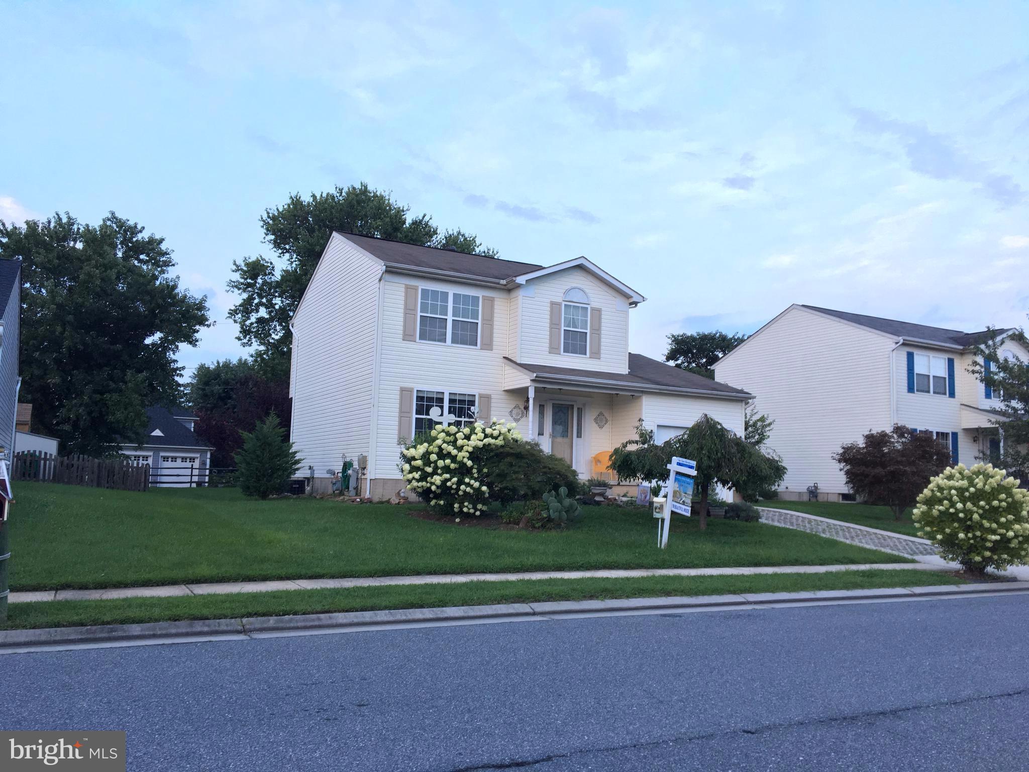 9316 Sea Point Road Baltimore, MD 21219 - Photo 2 of 30 a house with garden in front of it