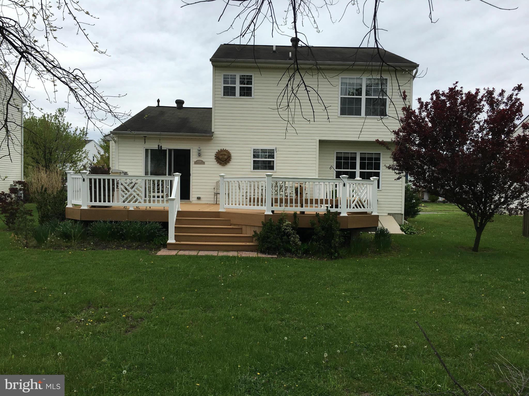 9316 Sea Point Road Baltimore, MD 21219 - Photo 28 of 30 a front view of a house with a garden