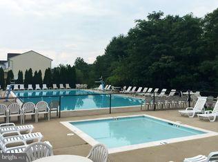 9316 Sea Point Road Baltimore, MD 21219 - Photo 4 of 30 a view of swimming pool with seating space and trees in the background