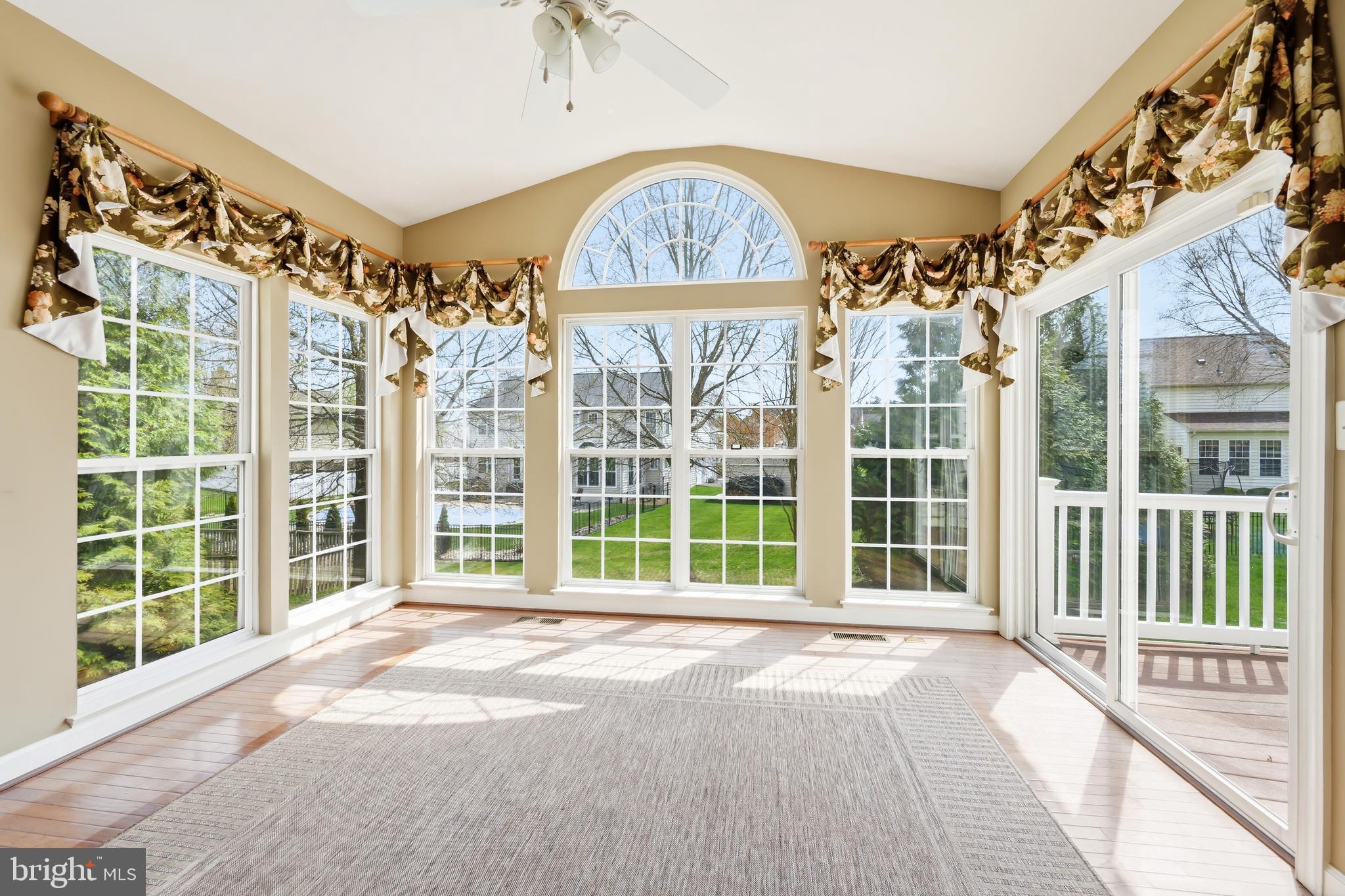 103 Sutton Way Chestertown, MD 21620 - Photo 20 of 53 a view of spacious bedroom with a large window and front door