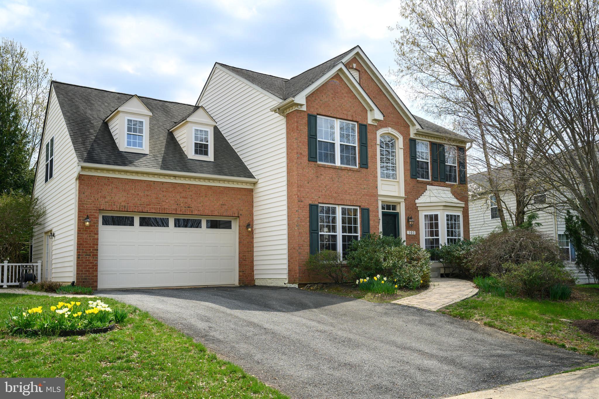 103 Sutton Way Chestertown, MD 21620 - Photo 2 of 53 a front view of a house with a yard and garage