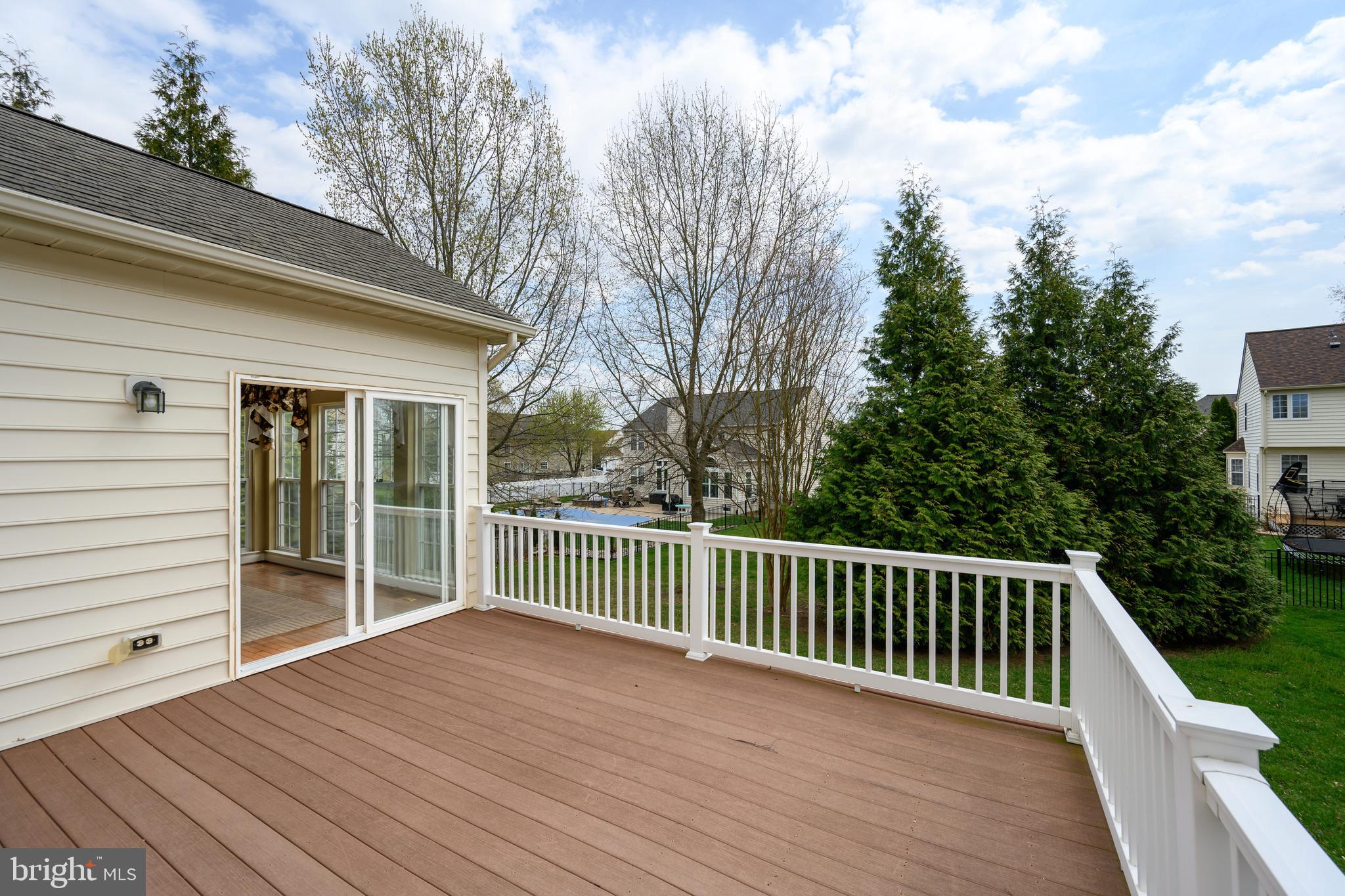 103 Sutton Way Chestertown, MD 21620 - Photo 22 of 53 a view of backyard with deck and wooden floor