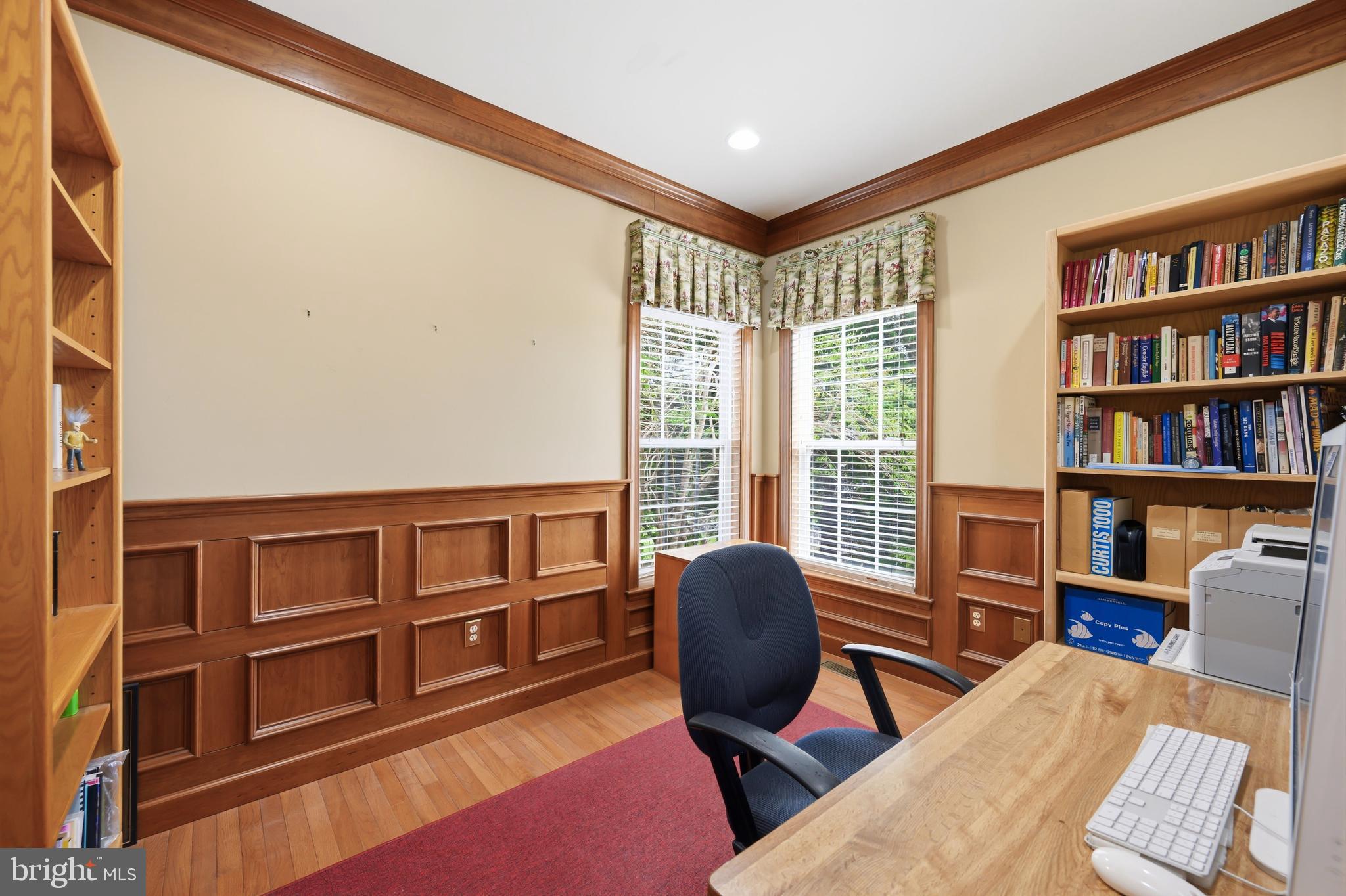 103 Sutton Way Chestertown, MD 21620 - Photo 29 of 53 a living room with furniture and a book shelf