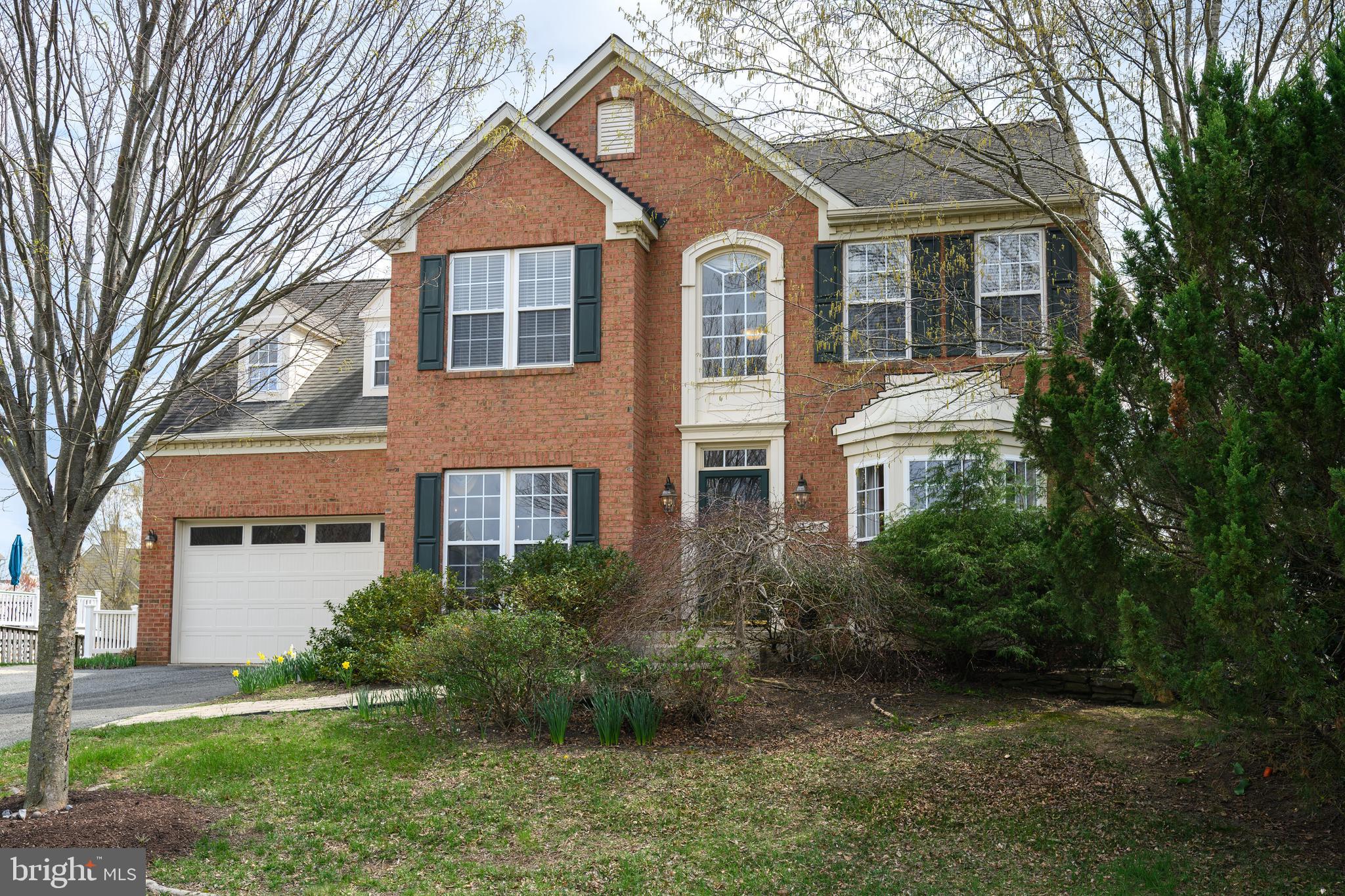 103 Sutton Way Chestertown, MD 21620 - Photo 3 of 53 a front view of a house with a yard and trees
