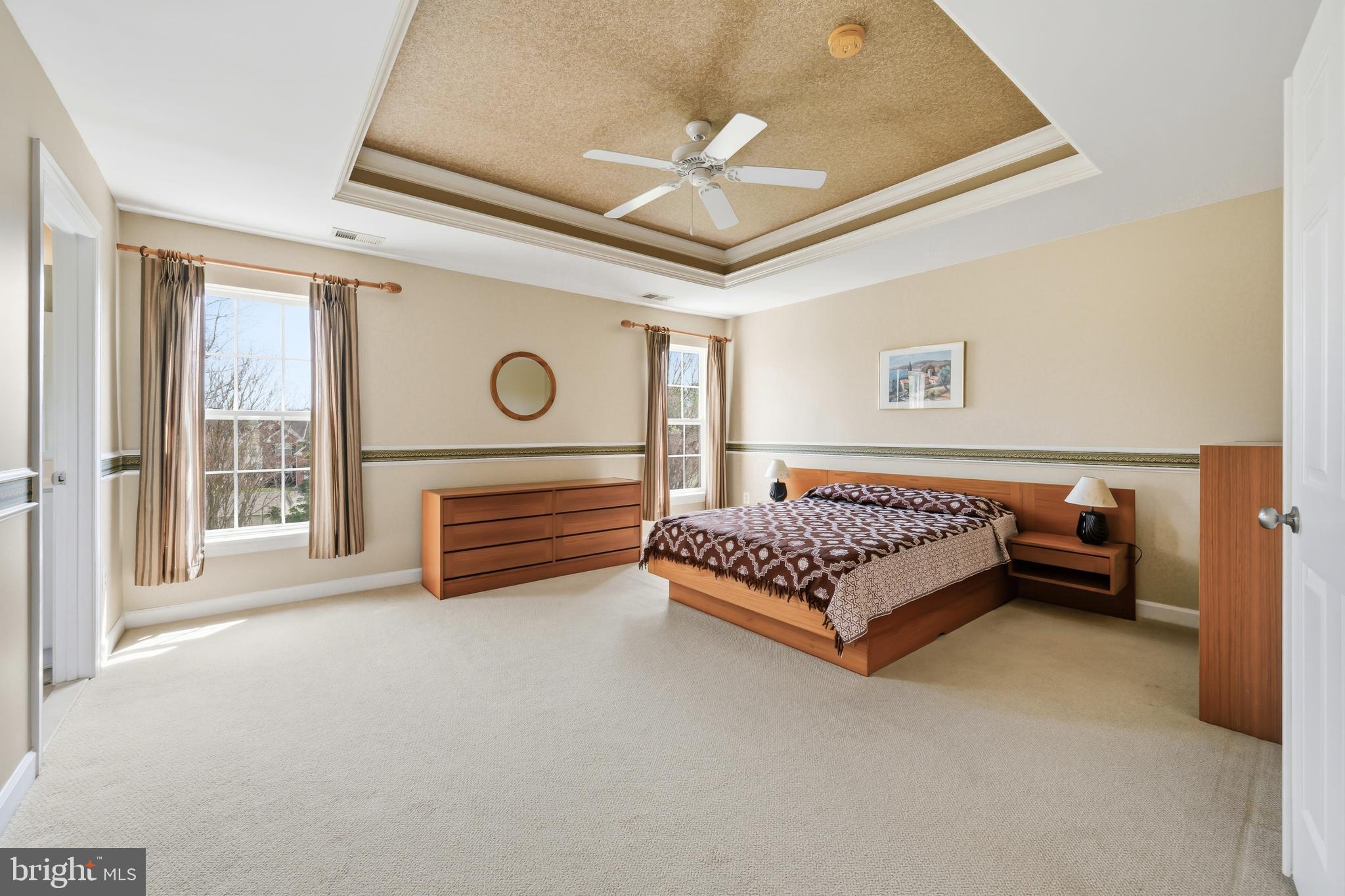 103 Sutton Way Chestertown, MD 21620 - Photo 33 of 53 a bedroom with a bed and a ceiling fan