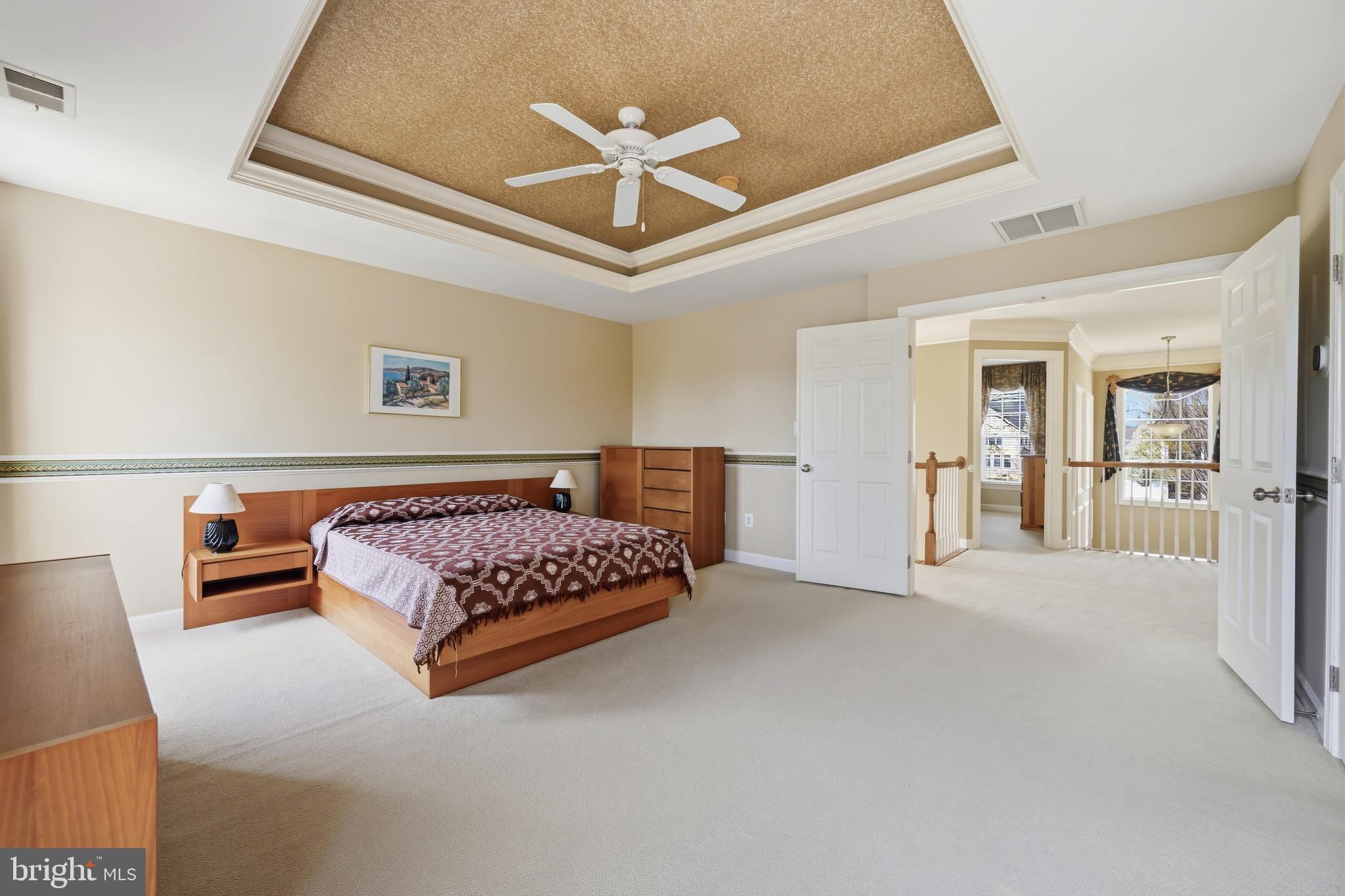 103 Sutton Way Chestertown, MD 21620 - Photo 35 of 53 a bedroom with a bed gym equipment and a view of en suite bathroom