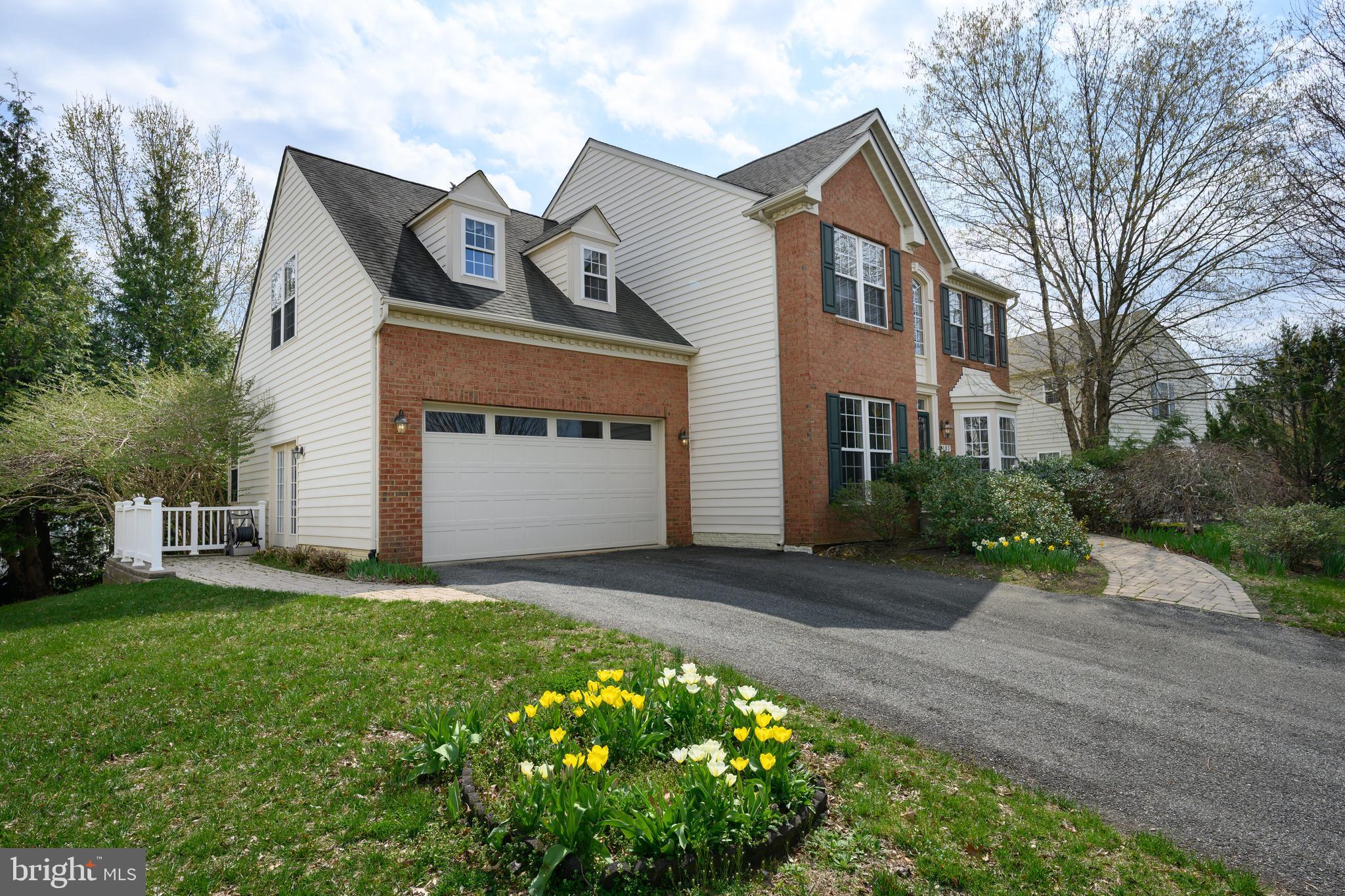 103 Sutton Way Chestertown, MD 21620 - Photo 4 of 53 a front view of a house with a garden and yard