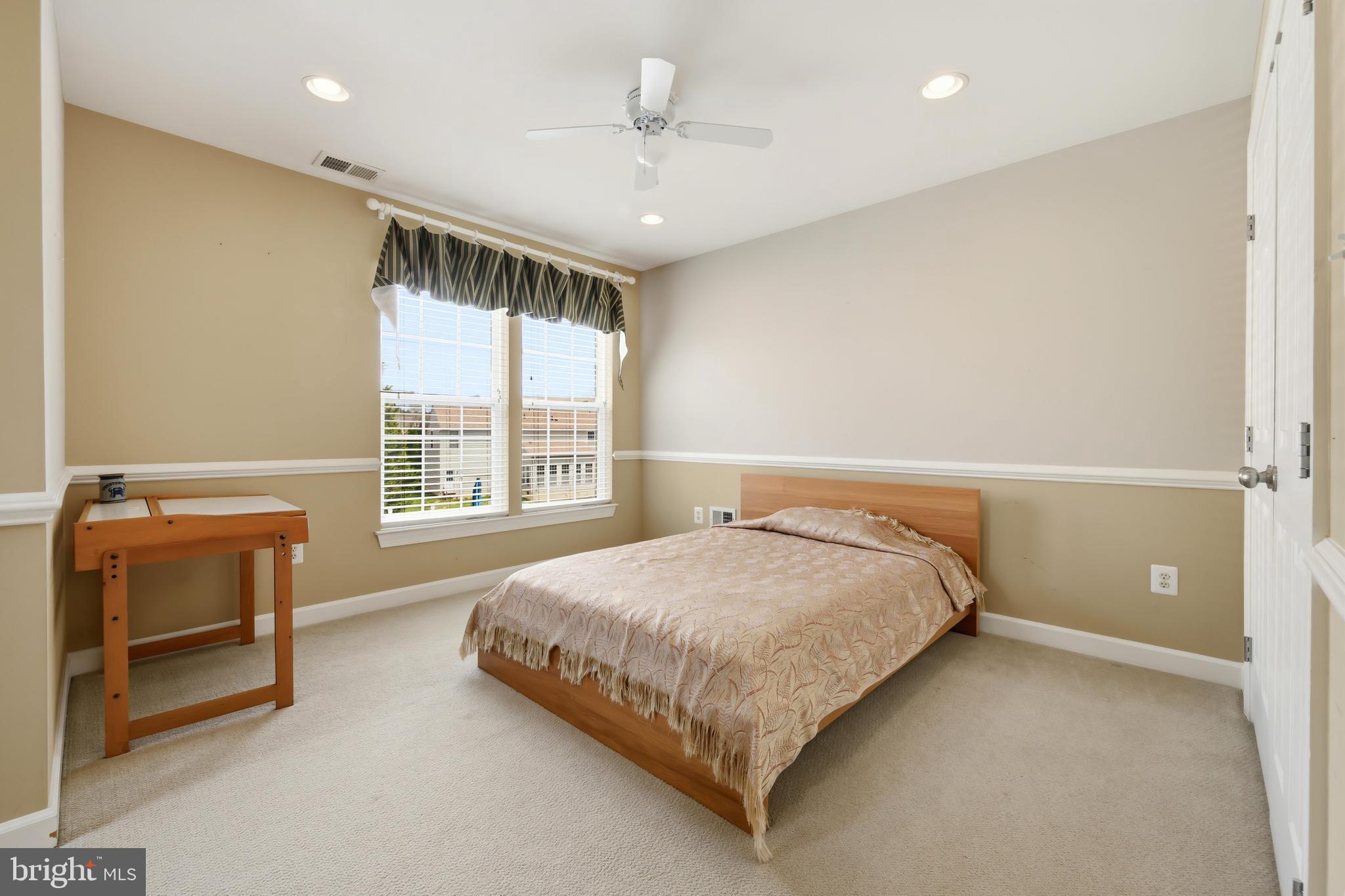 103 Sutton Way Chestertown, MD 21620 - Photo 42 of 53 a bedroom with a bed and a window
