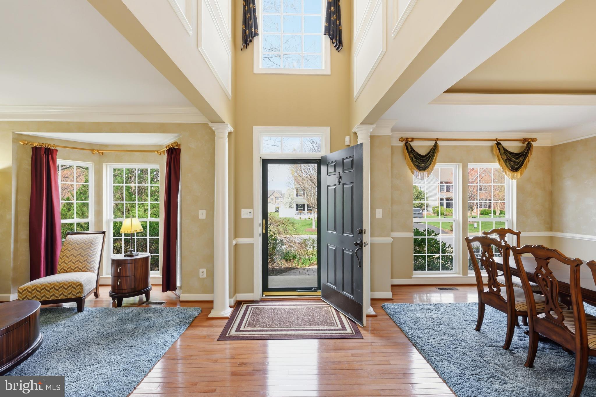 103 Sutton Way Chestertown, MD 21620 - Photo 9 of 53 a living room with furniture and large windows