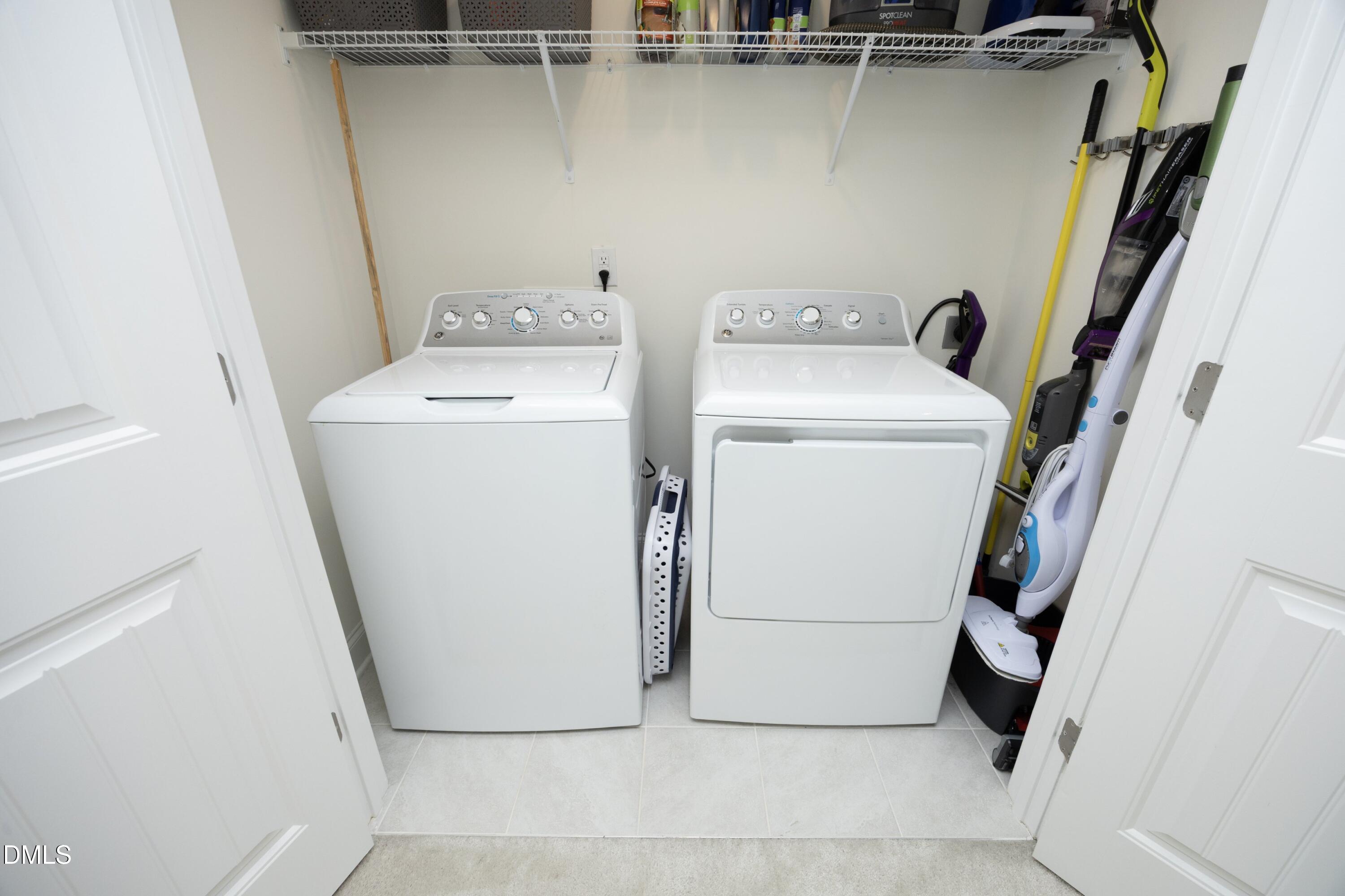 1002 Heartstone Way Durham, NC 27713 - Photo 23 of 35 a utility room with dryer and washer