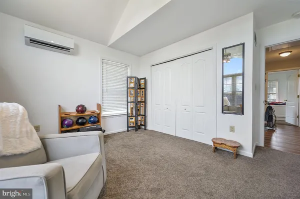 a living room with furniture and a couch