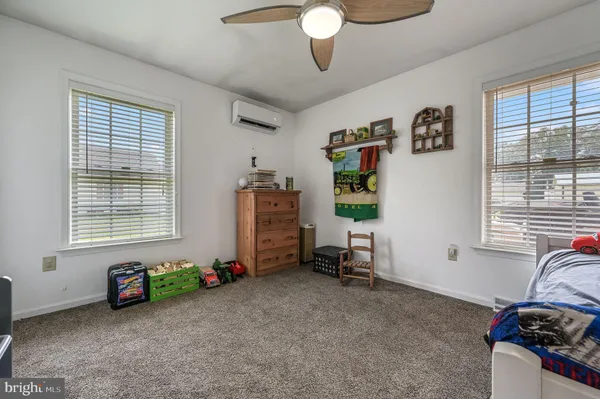 a view of livingroom with furniture and windows