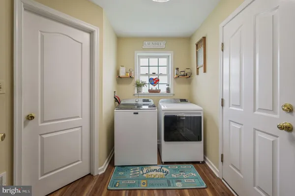 a utility room with a window dryer and washer