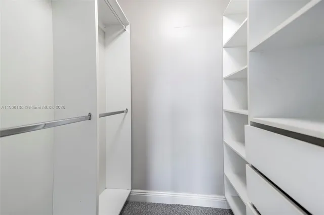 a view of a swimming pool and outdoor space