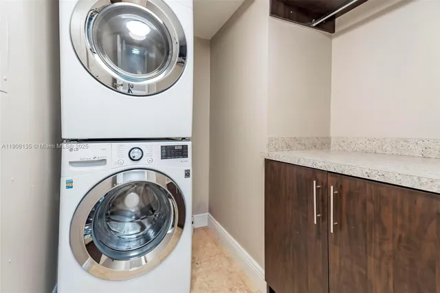 a row of palm trees and fire pit