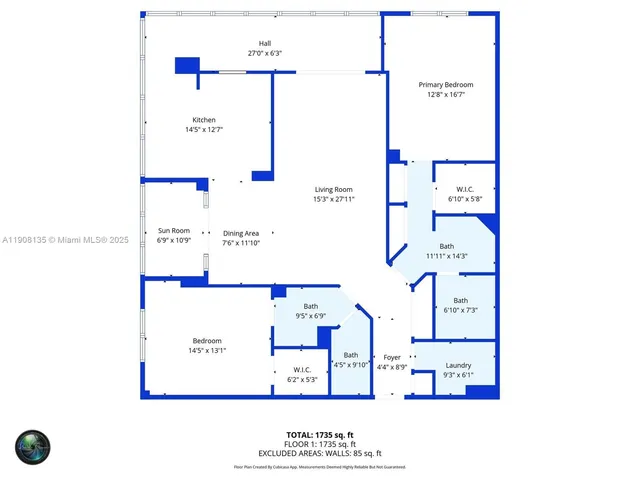 a view of an empty room with furniture and a window