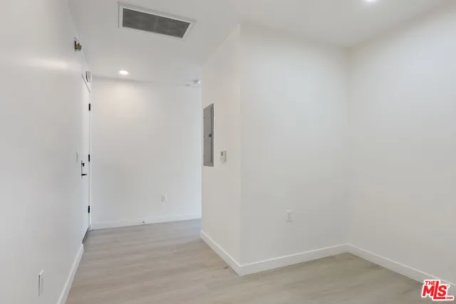 a view of small space with wooden floor