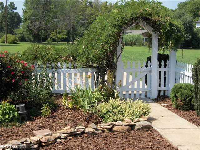 5834 Pepper Road Oak Ridge, NC 27310 - Photo 2 of 16 Landscaping.