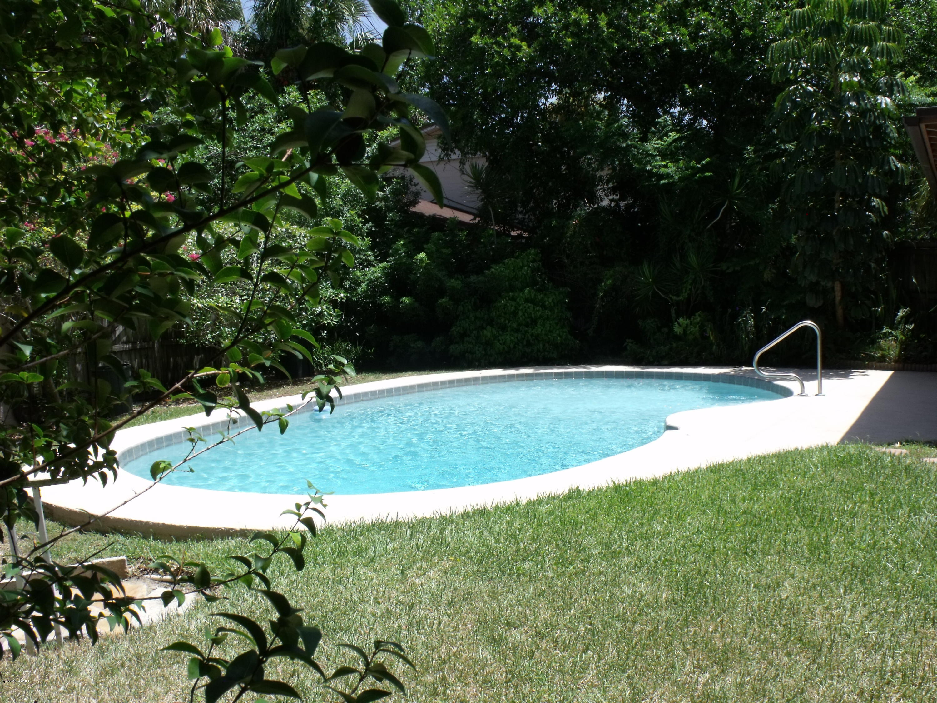 101 Valencia Road Rockledge, FL 32955 - Photo 3 of 13 Back yard and Pool