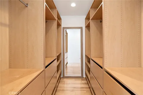 a view of balcony with wooden floor