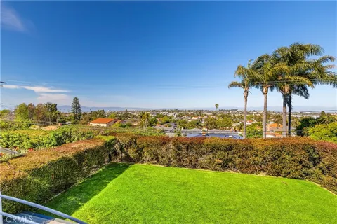 a view of a yard with an ocean