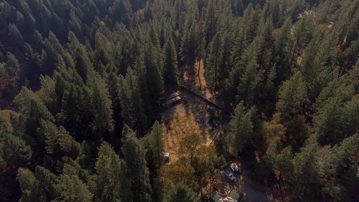 5727 Starkes Grade Road Pollock Pines, CA 95726 - Photo 23 of 31 a view of a house with a yard