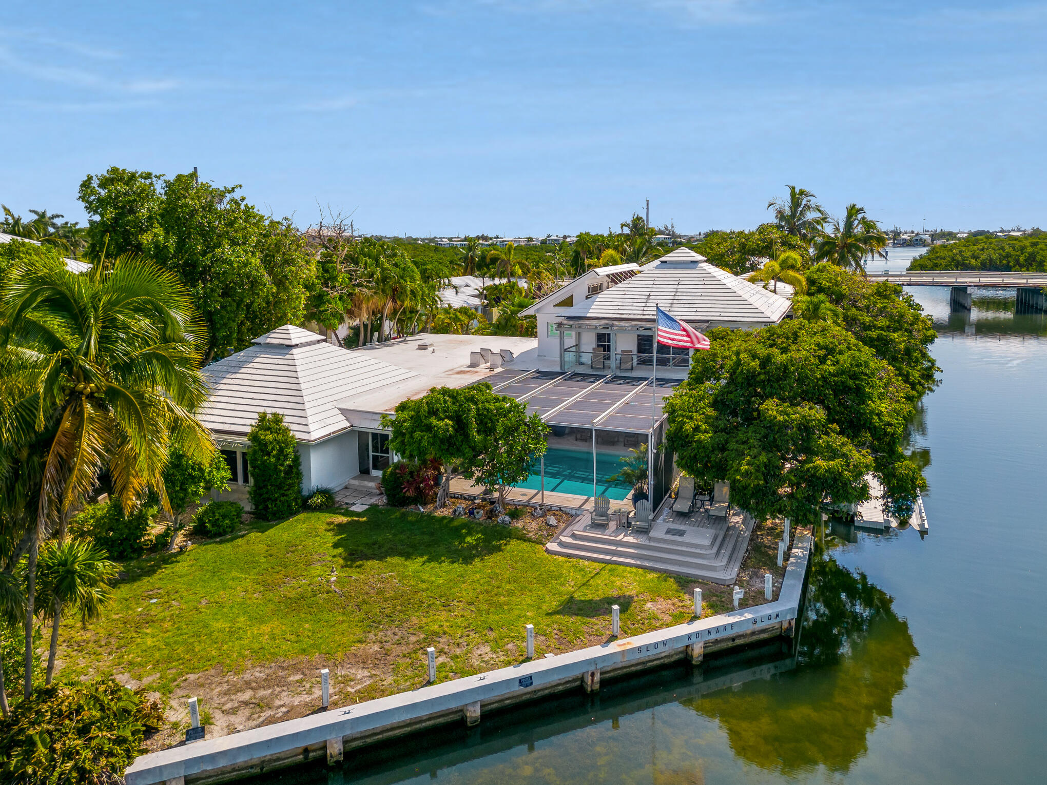 1 Go Lane Key West, FL 33040 - Photo 1 of 49 an aerial view of a house with a garden and lake view
