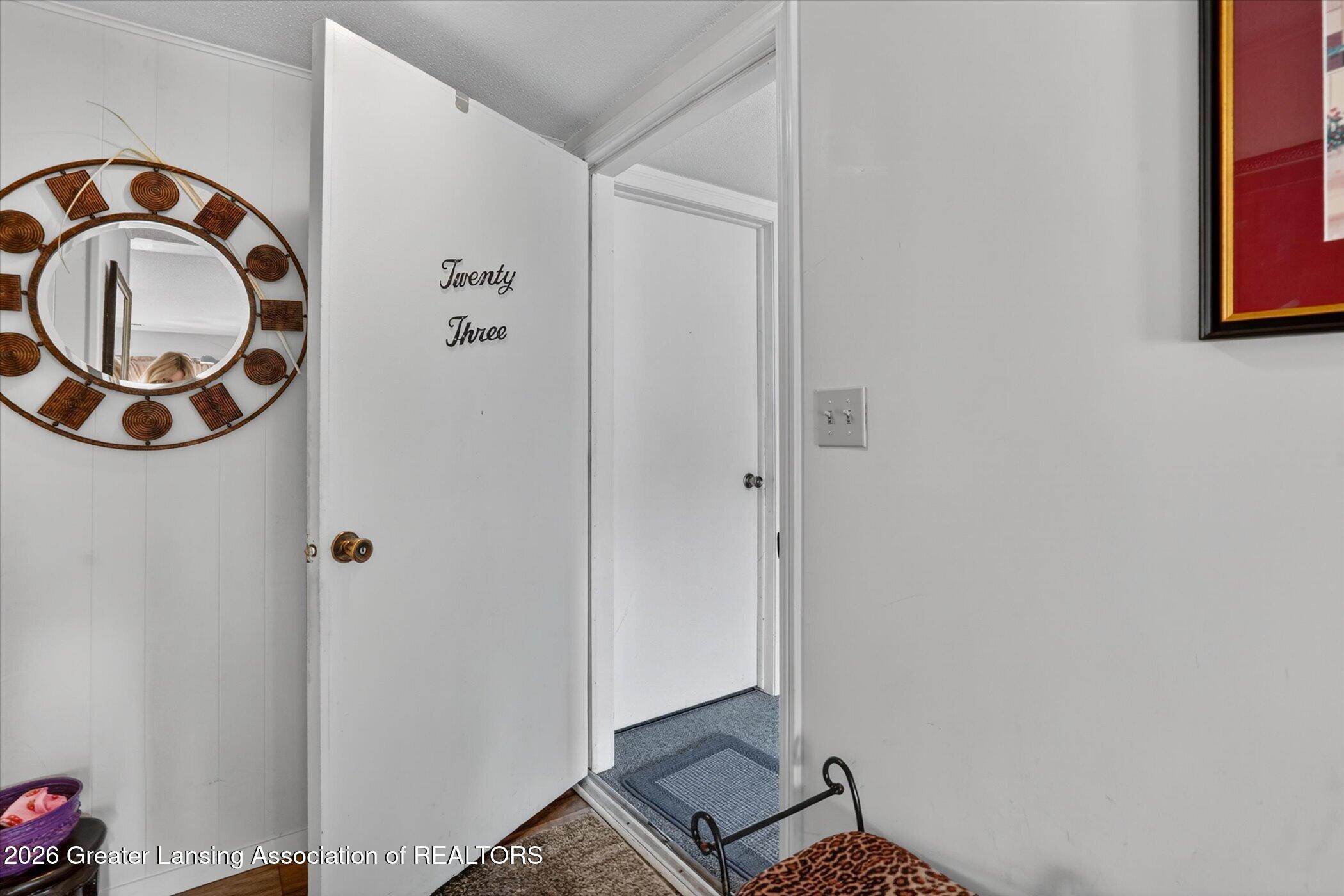 4809 Gull Road, Unit 23 Lansing, MI 48917 - Photo 7 of 26 07-4809-Gull-Rd-apt-23-WindowStill-Real-