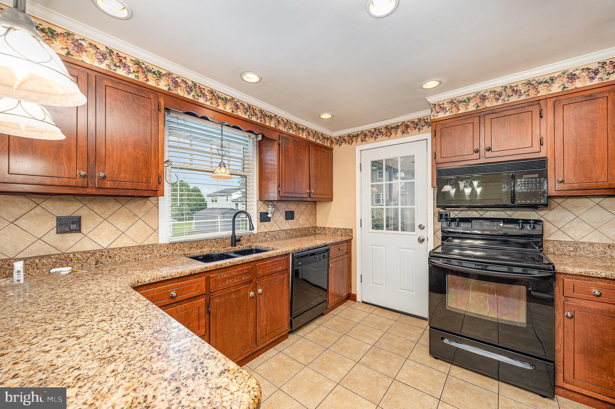 1016 Teakwood Lane Enola, PA 17025 - Photo 10 of 37 Kitchen with Granite countertops and ceramic tile