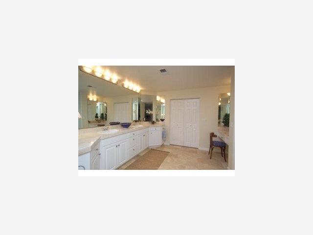 58 Merion Road Half Moon Bay, CA 94019 - Photo 9 of 9 a bathroom with a sink a mirror and a bathtub