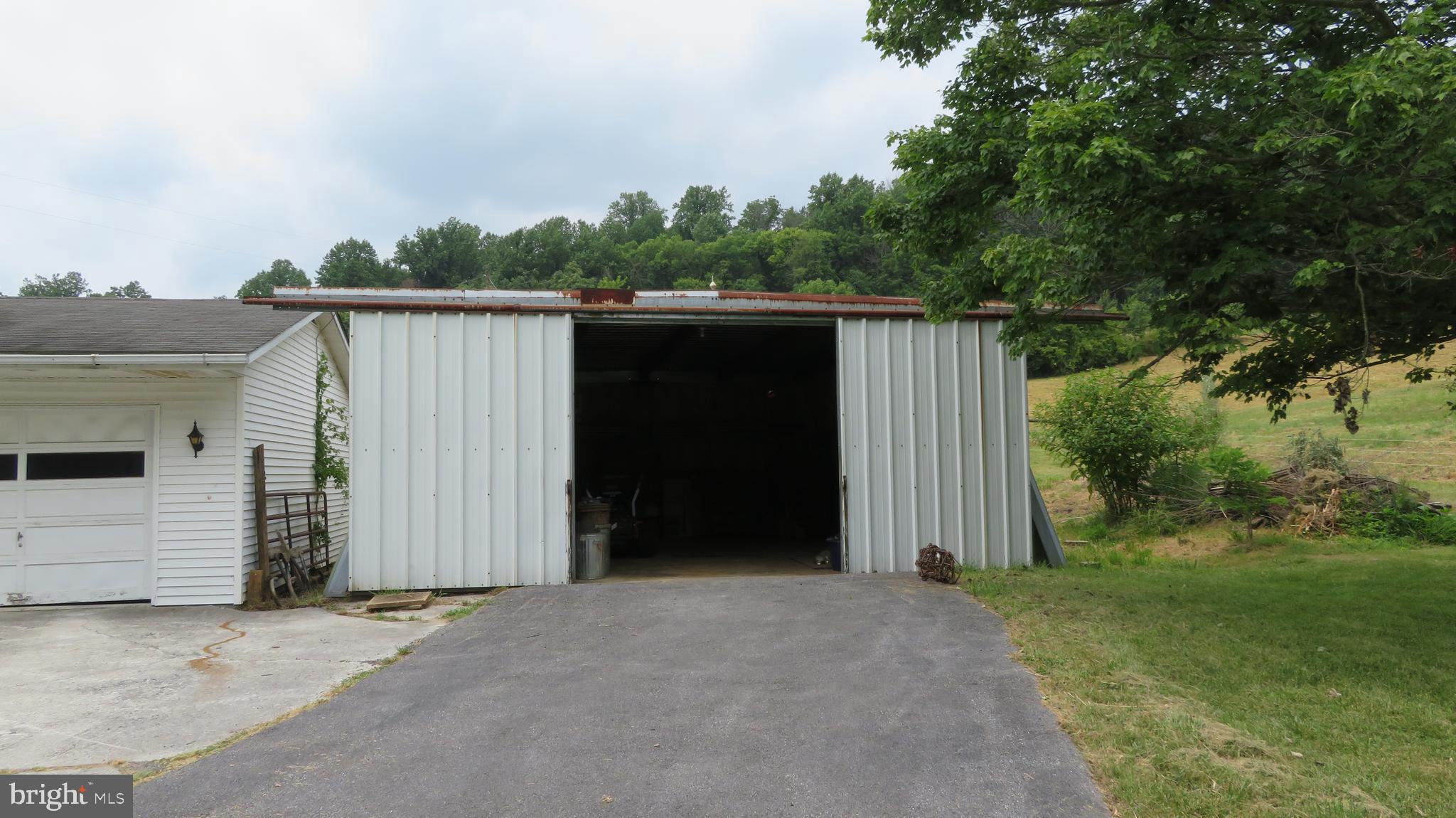 509 Fodderstack Road Huntly, VA 22640 - Photo 47 of 78 Machine Shed with doors open