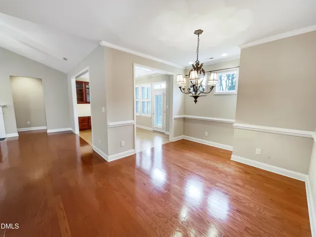 a view of a livingroom with wooden floor