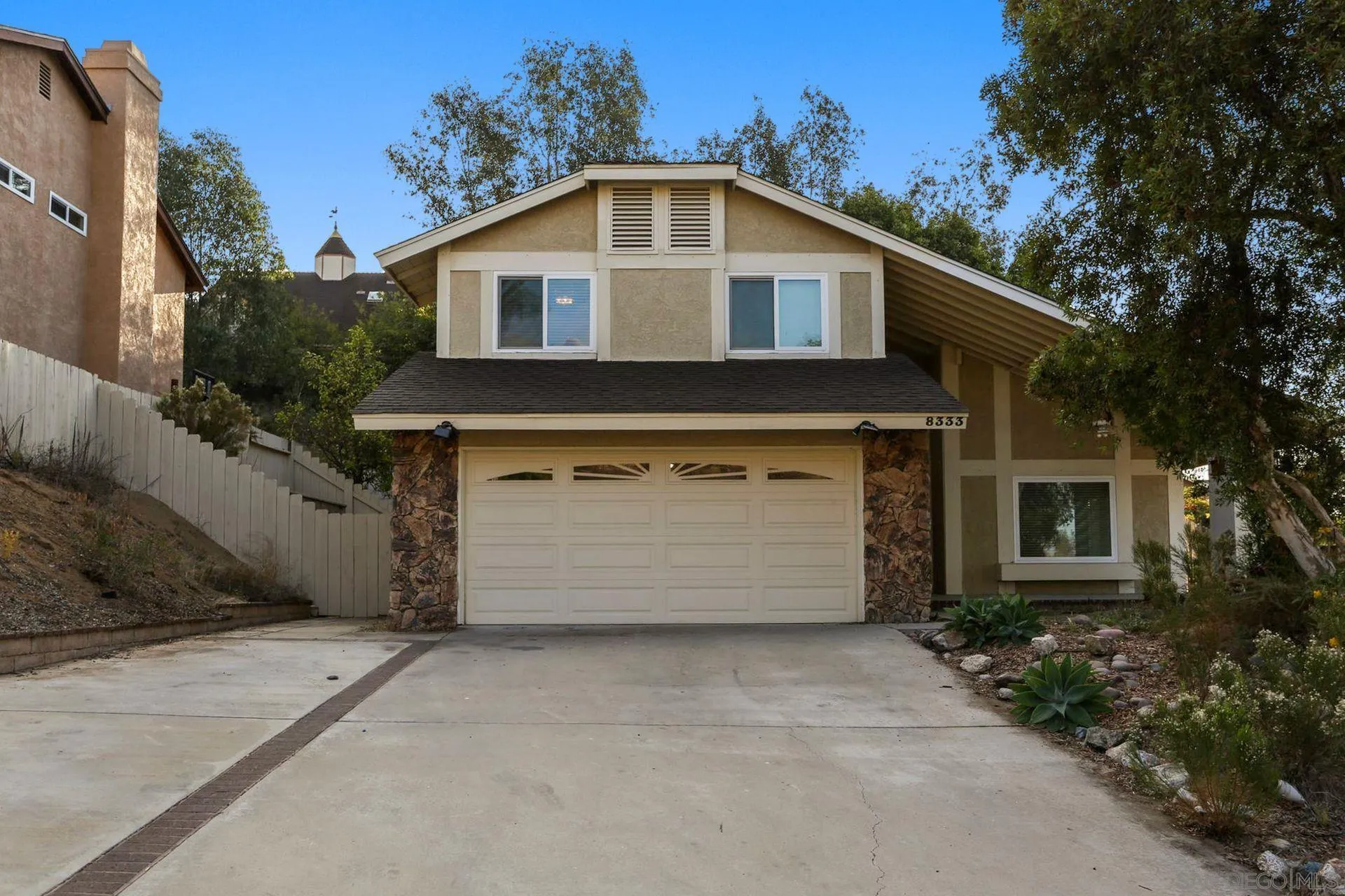 8333 Oconnell Road El Cajon, CA 92021 - Photo 1 of 32 a front view of a house with a garage