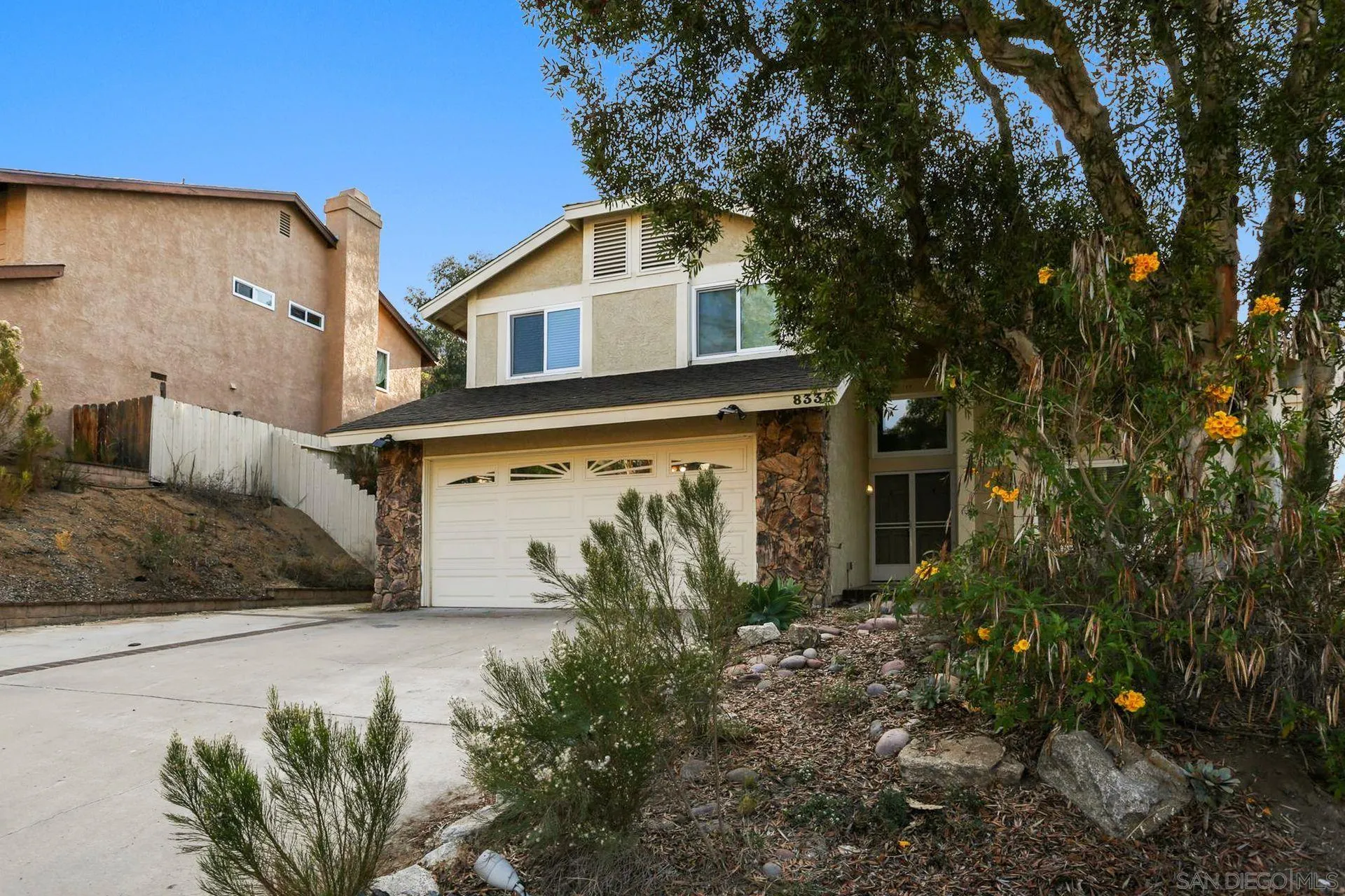 8333 Oconnell Road El Cajon, CA 92021 - Photo 3 of 32 a front view of a house with garden