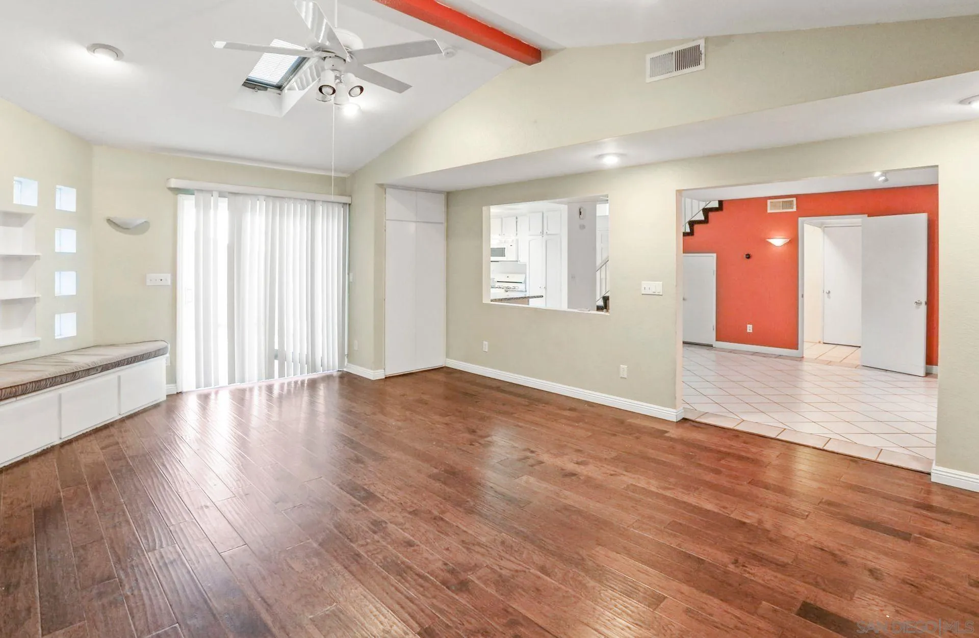 8333 Oconnell Road El Cajon, CA 92021 - Photo 9 of 32 a view of an empty room with wooden floor and a window
