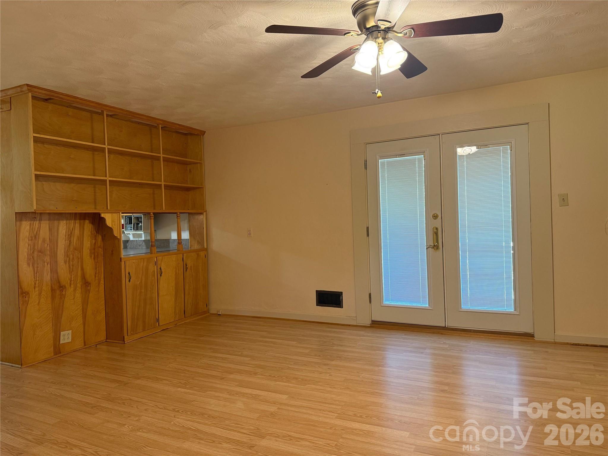 3532 16th Street Northeast, Unit 1 Hickory, NC 28601 - Photo 14 of 43 an empty room with wooden floor and closet