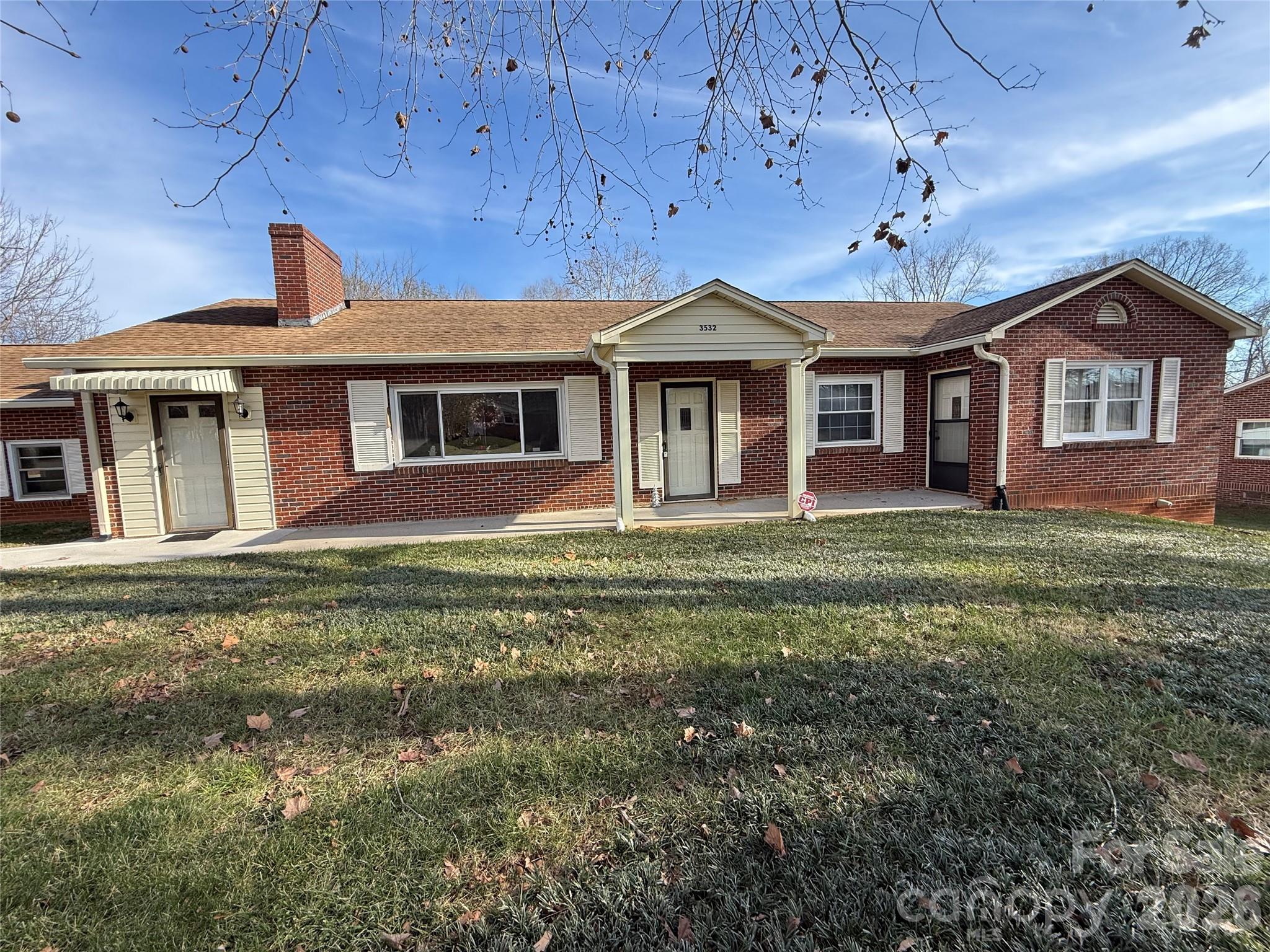 3532 16th Street Northeast, Unit 1 Hickory, NC 28601 - Photo 2 of 43 a front view of a house with a yard