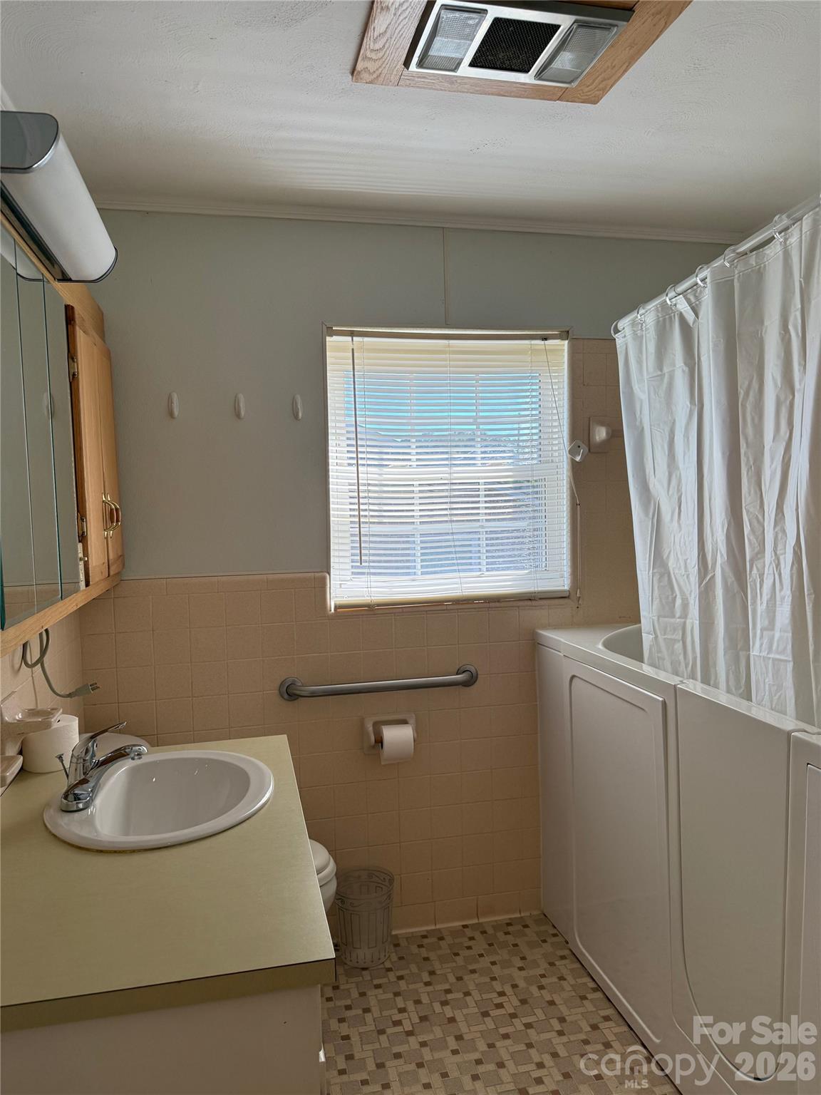 3532 16th Street Northeast, Unit 1 Hickory, NC 28601 - Photo 21 of 43 a bathroom with a sink and a mirror
