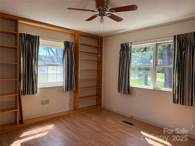 a view of a room with wooden wall